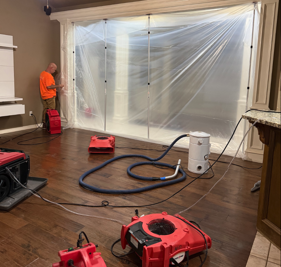 Professional structural drying equipment operating after water damage in Edmond Oklahoma